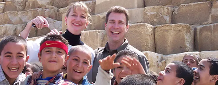 Mark & Gina and Egyptian boys at the Great Pyramid